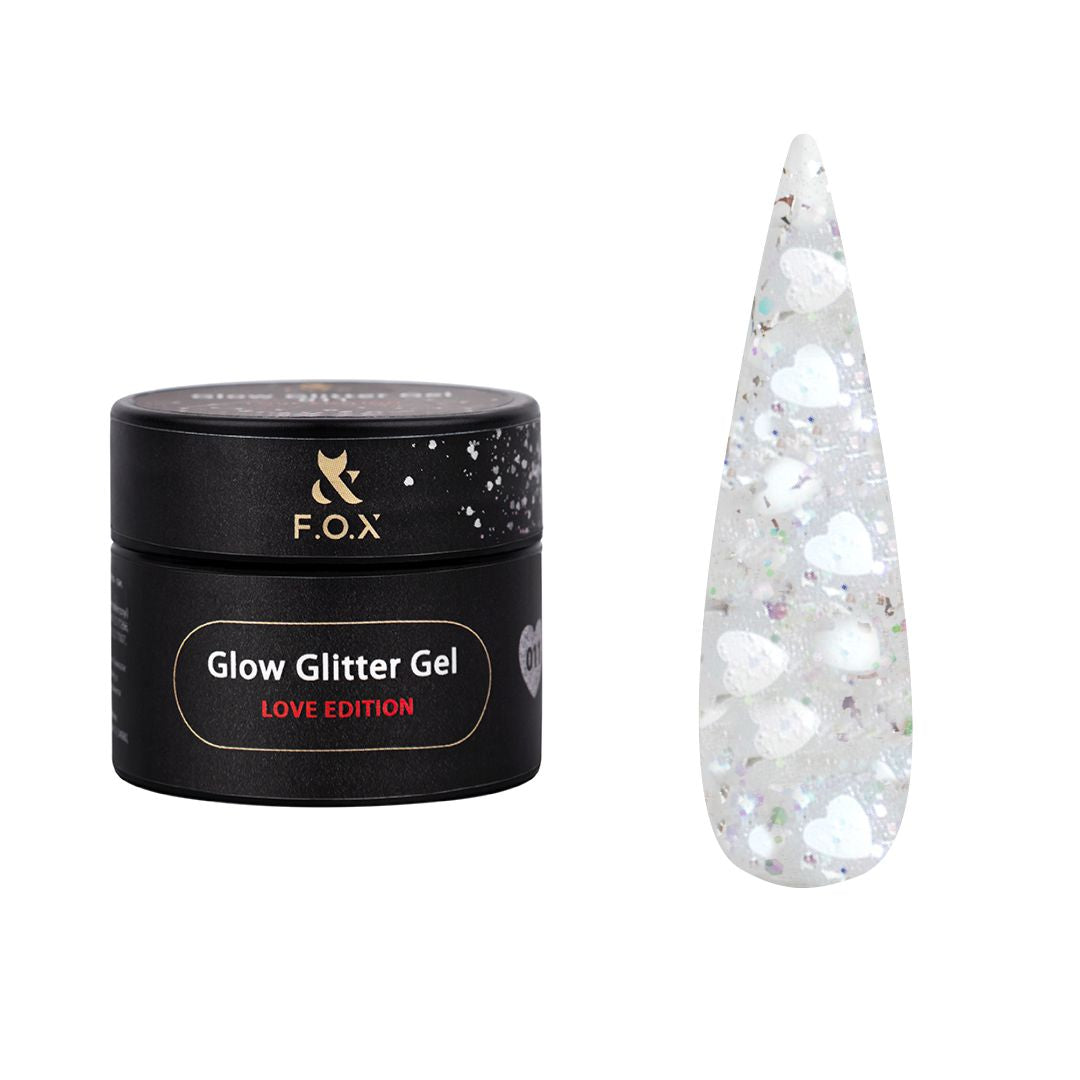 F.O.X Glow Glitter Gel med hvite hjerter, sekskanter og folie for et elegant negledesign.