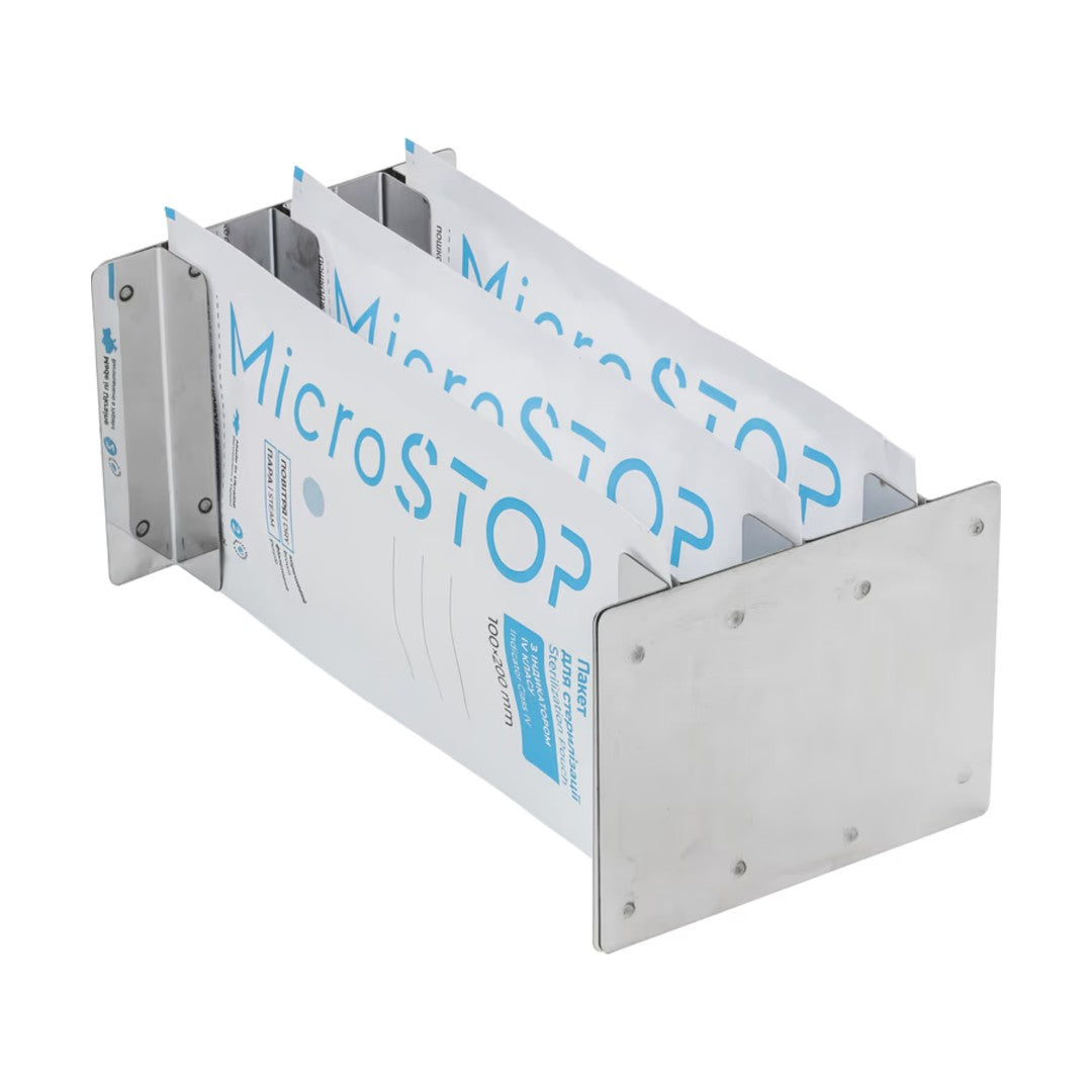 Holder til MicroSTOP COMPACT med tre steriliseringsposer plassert vertikalt
